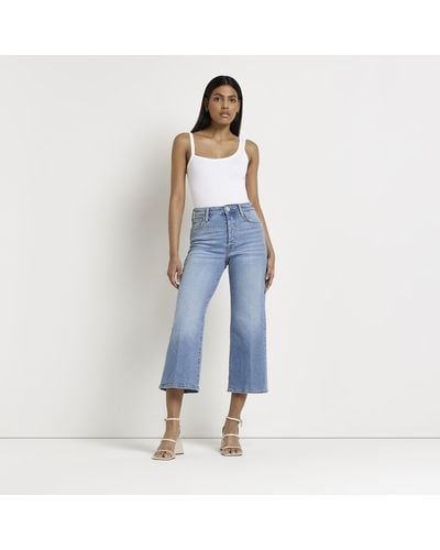 River Island Blue Mid Rise Cropped Flared Jeans