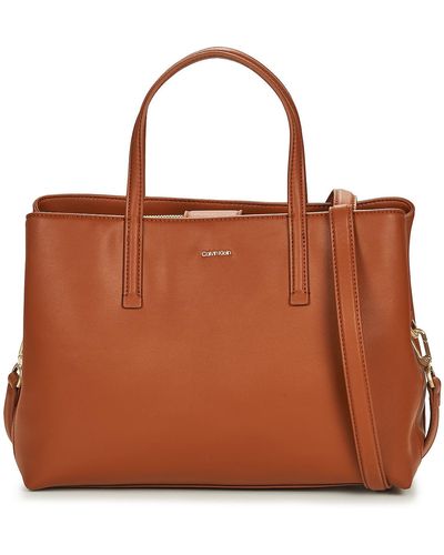 Calvin Klein Handbags Ck Must Tote Md - Brown