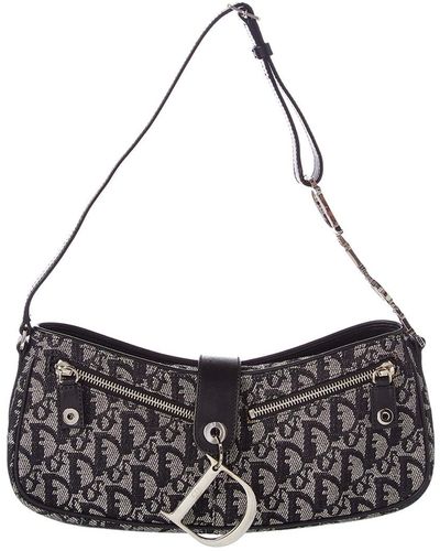 Dior Ethnic Zip Shoulder Bag with a hanging heart tag is chic