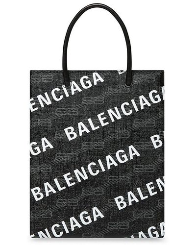 Signature medium east-west shopper bag bb monogram coated canvas
