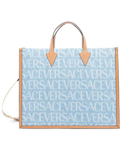 Versace Tote Bag With All-over Logo Print In Light Blue Canvas Man -  ShopStyle