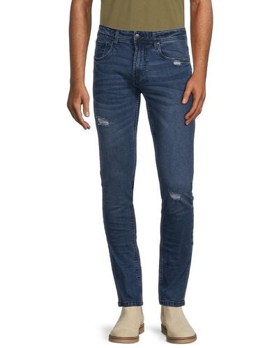 Roberto Cavalli Mid Rise Distressed & Whiskered Jeans - Blue