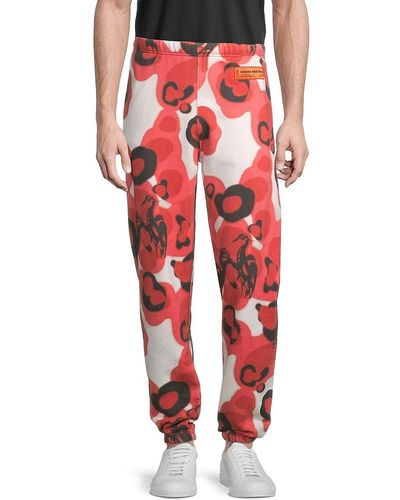 Heron Preston Washed Camo Heron jogger Trousers - Red