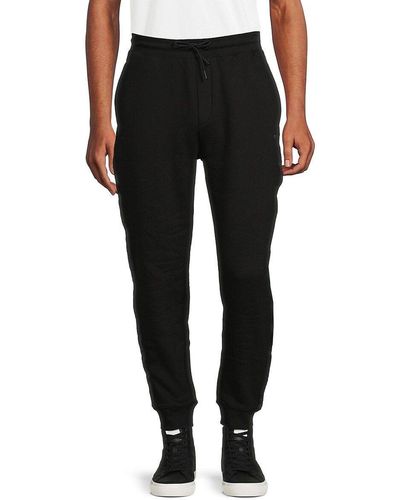 HUGO Baboon Velvet joggers in Black for Men