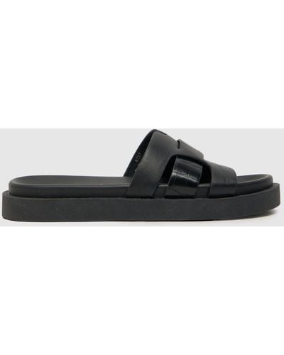Schuh Timmy Croc Footbed Sandals In - Black
