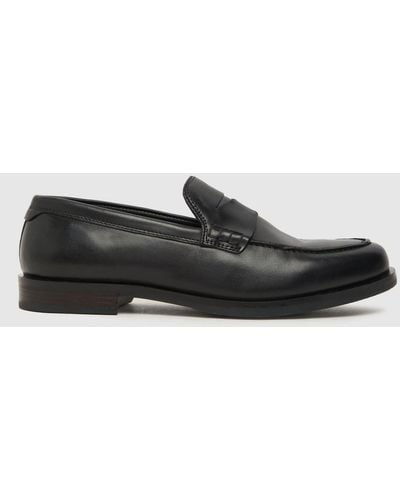 Schuh Rufus Penny Loafer Shoes In - Black