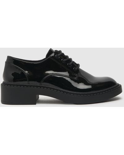 Schuh Leonard Patent Lace Up Flat Shoes In - Black