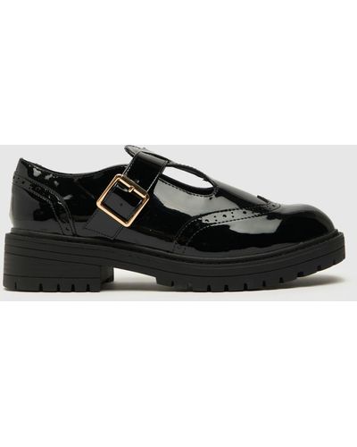 Schuh Wide Fit Luca Patent Tbar Flat Shoes In - Black