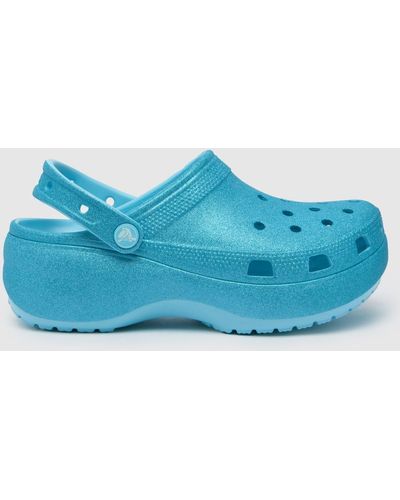 Crocs™ Classic Platform Glitter Clog Sandals In - Blue