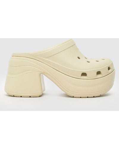 Crocs™ Siren Heeled Clog Sandals In - Natural