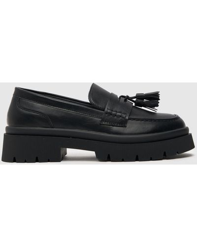 Schuh Leyton Chunky Tassel Loafer Flat Shoes In - Black