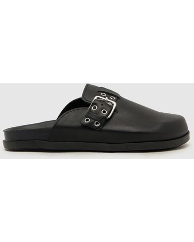 Schuh Tabbie Leather Closed Toe Mule Sandals In - Black