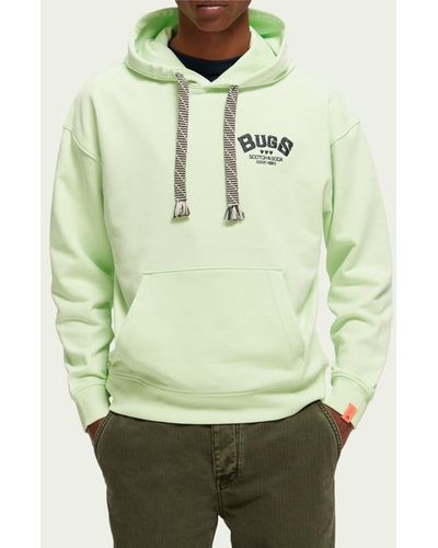 Scotch & Soda Sweat à capuche graphique unisexe à capuche Looney Tunes x en coton bio - Vert