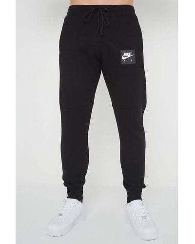 Nike Air Fleece joggingbroek In Zwart - Blauw