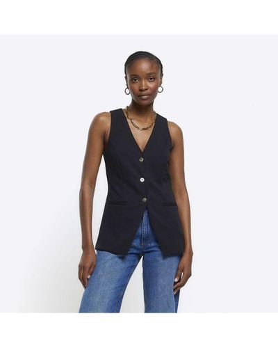 Black waistcoat clearance with blue jeans
