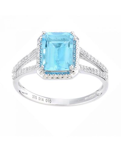 DIAMANT L'ÉTERNEL 9kt Witgouden Ring Met 0,1 Ct Diamant En Blauwe Topaas
