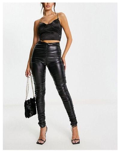 https://cdna.lystit.com/400/500/tr/photos/secretsales/5cd37c6d/asos-Black-Leather-Look-Ruched-legging.jpeg