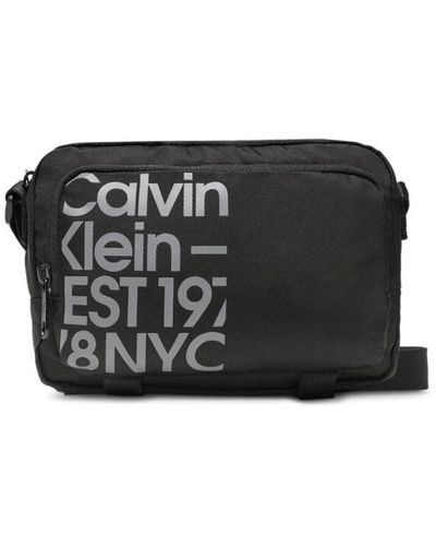 Calvin Klein Multi-Pocket Adjustable Strap Across-Body Bag - Black