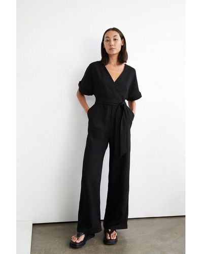 Warehouse Wrap Front Tie Waist Relaxed Jumpsuit - Black