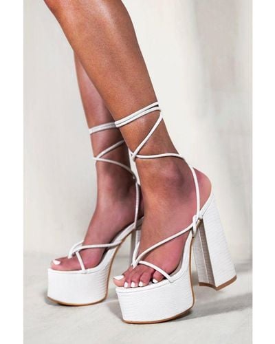 Where's That From Mabel Block High Heels With Thong Strap & Lace Up Detail - White