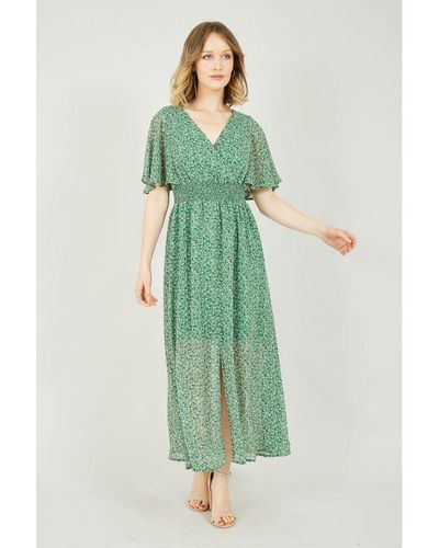 Yumi' Groene Maxi-jurk Met Ruches En Kleine Bloemetjesprint
