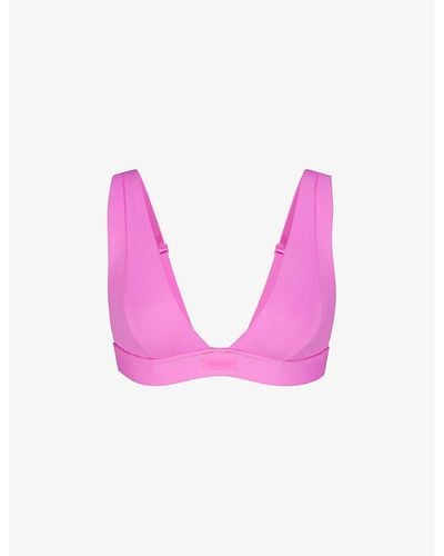 Skims Signature Swim Plunge Stretch Recycled-nylon Bikini Top - Pink