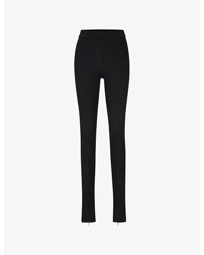 BOSS X Naomi Campbell Zipped-hem Slim-fit High-rise Stretch-recycled Jersey Trousers - Black
