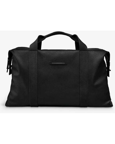 Horizn Studios Sofo Weekender M Waxed Recycled Coated Cotton-canvas Holdall - Black