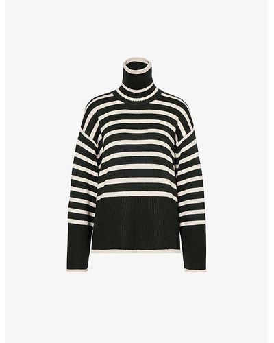 Totême Striped Turtleneck Wool And Organic Cotton-blend Knitted Sweater - Black