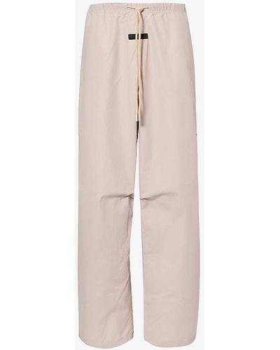 Fear Of God Elasticated-waistband Brand-appliqué Mid-rise Wide-leg Cotton-blend Trousers - Natural
