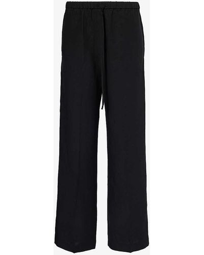 Totême Wide-leg Relaxed-fit Woven Trousers - Black