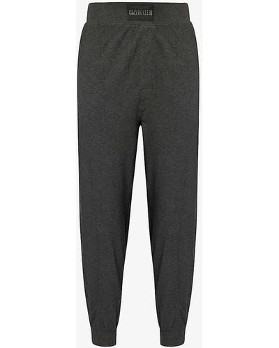 Calvin Klein Brand-patch Relaxed-fit Stretch-cotton Trousers - Grey