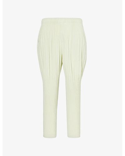 Homme Plissé Issey Miyake Pleated Tapered-leg Relaxed-fit Knitted Pants - Yellow