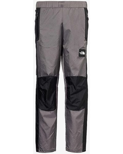 The North Face Wind Brand-patch Straight-leg Mid-rise Shell Trousers - Grey