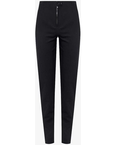 Alaïa Tapered-leg High-rise Stretch-woven Trousers - Blue