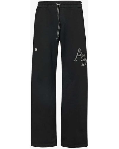 Amiri staggered Logo-appliqué Cotton-jersey jogging Bottoms - Black