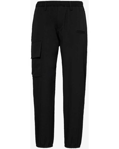 Yohji Yamamoto Flap-pocket Mid-rise Tapered-leg Wool Trousers - Black