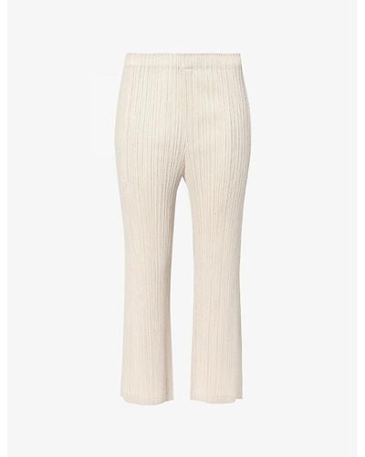 Pleats Please Issey Miyake Pleated Mid-rise Flared-leg Knitted Pants - Natural