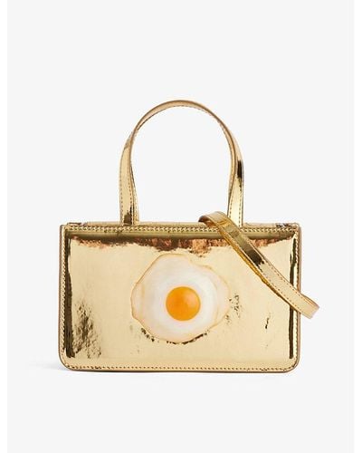 Puppets and Puppets egg-appliqué Small Faux-leather Top-handle Bag - Metallic