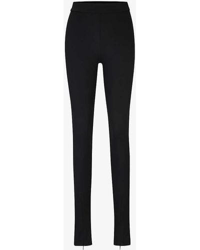 BOSS X Naomi Campbell Zipped-hem Slim-fit High-rise Stretch-recycled Jersey Trousers - Black