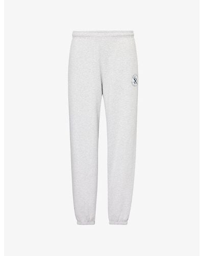 Sporty & Rich Brand-patch Cuffed Cotton-blend Jersey jogging Bottoms - White