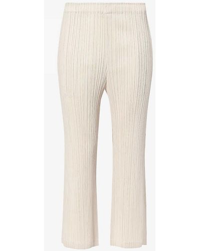 Pleats Please Issey Miyake Pleated Mid-rise Flared-leg Knitted Trousers - Natural