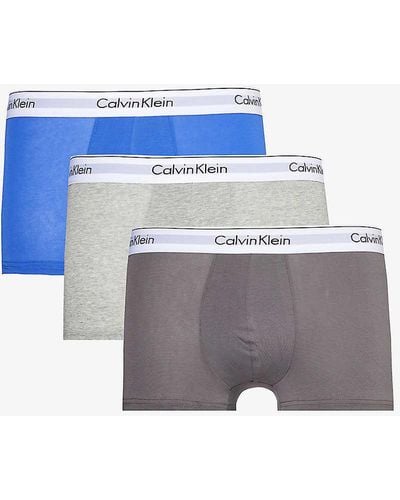 Calvin Klein Branded-waistband Mid-rise Pack Of Three Stretch-cotton Trunks X - Blue