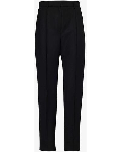 Totême Pressed-crease Tapered Mid-rise Recycled-polyester And Wool-blend Trousers - Black
