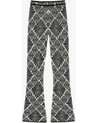Sandro Floral-print Flared-leg Stretch-knit Trousers - Grey
