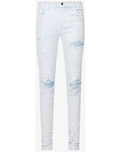 Amiri Distressed Brand-patch Slim-fit Jeans - White