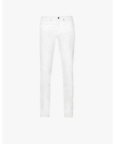 FRAME L'homme Slim-fit Tapered Stretch-denim Jeans - White