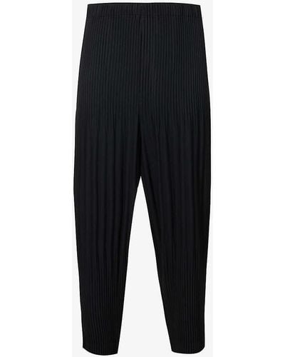 Homme Plissé Issey Miyake Dropped-crotch Pleated Relaxed-fit Knitted Trousers - Black