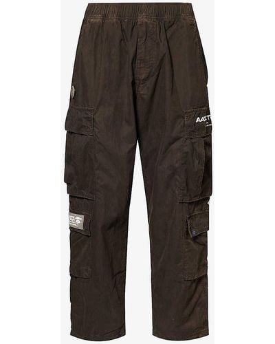 Aape Tapered-leg Mid-rise Cotton-blend Trousers - Black