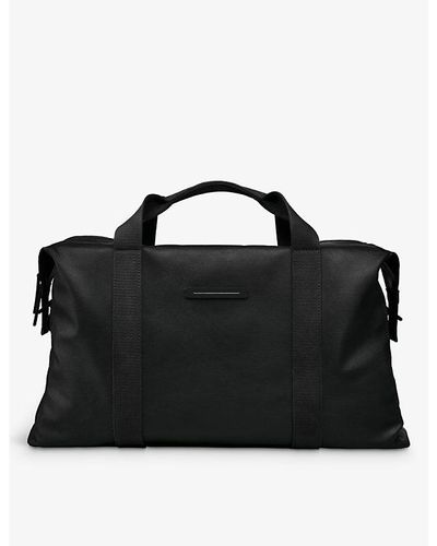 Horizn Studios Sofo Weekender M Waxed Recycled Coated Cotton-canvas Holdall - Black